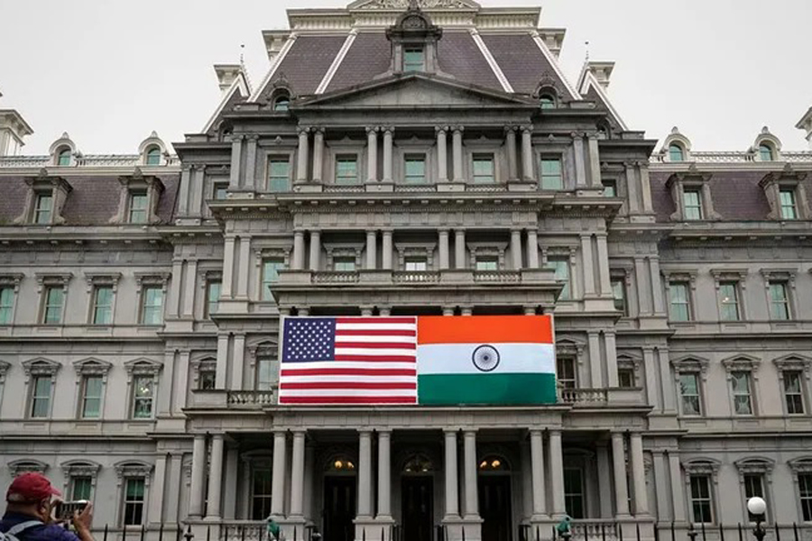 The flags of the United States and India are displayed on the Eisenhower Executive Office Building at the White House in Washington, US, June 21, 2023.