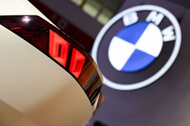 A BMW Vision Neue Klasse is displayed next to the company's logo during an event a day ahead of the official opening of the 2023 Munich Auto Show IAA Mobility, in Munich, Germany, September 4, 2023. REUTERS/Angelika Warmuth/file photo
