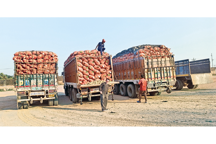 Three trucks laden with potatoes imported from India enter the Bangladesh territory through the Hili land port. The import activity from the neighbouring country began on Saturday noon. — Photo: Focus Bangla
