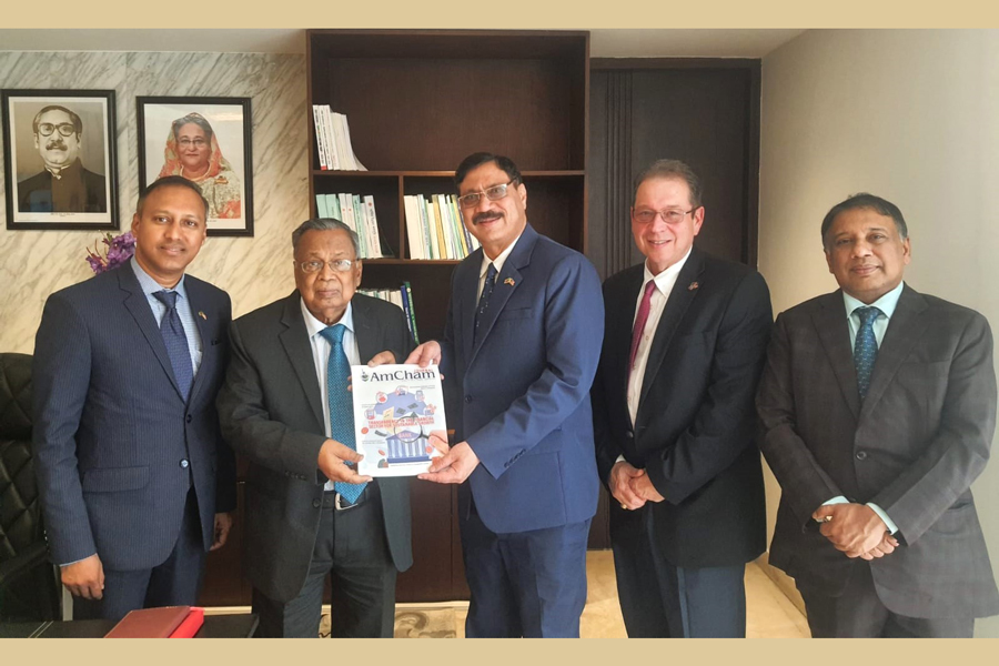 Mr Abul Hassan Mahmood Ali, MP, the finance minister, was seen with the members of the AmCham executive committee on Thursday at the Bangladesh Secretariat in Dhaka city. Also present on the left were Mr Al-Mamun M Rashel, treasurer of AmCham; Mr Syed Ershad Ahmed, president of AmCham; Mr Eric M Walker, vice president of AmCham; and on the right was Mr Md Moinul Huq, EC member of AmCham.
