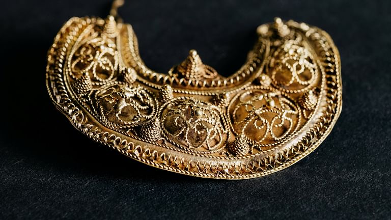 Part of the 1000-year-old medieval treasure discovered in Hoogwoud, Netherlands, consisting of jewellery and silver coins, is shown in this undated handout picture obtained by Reuters. Archeologie West-Friesland/REUTERS