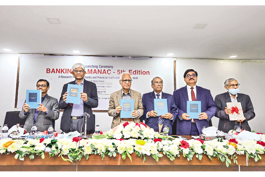 Former Bangladesh Bank governor Saleh Uddin Ahmed, noted economist Dr Wahiduddin Mahmud, Association of Bankers Bangladesh former chairman Mohammad Nurul Amin and Banking Almanac project director Abder Rahman, among others, holding copies after unveiling the cover of the fifth edition of the Bank Almanac at the National Press Club in the city on Saturday (Story on page-1) — FE Photo