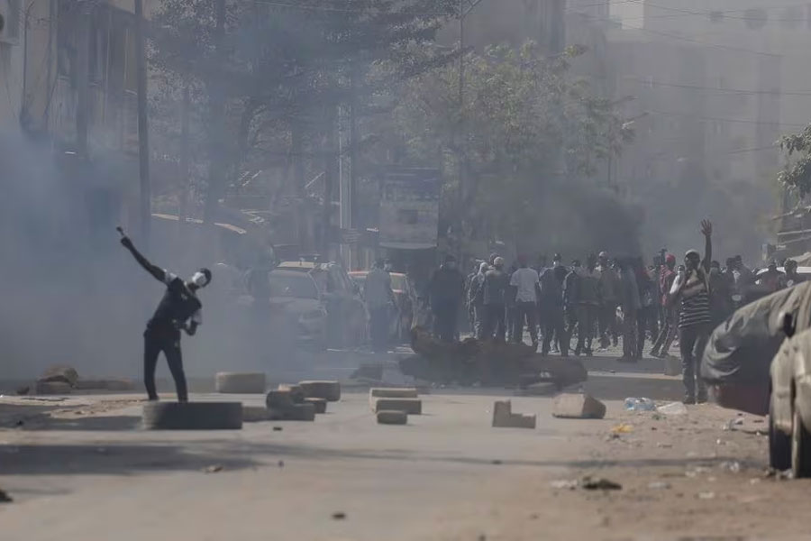 Senegalese demonstrators clash with riot police as they protest against the postponement of the Feb. 25 presidential election, in Dakar, Senegal February 9, 2024.