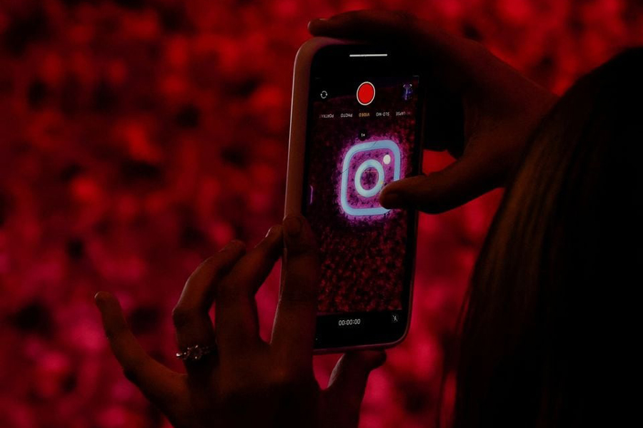 A logo of mobile application Instagram is seen on a mobile phone, during a conference in Mumbai, India, September 20, 2023.