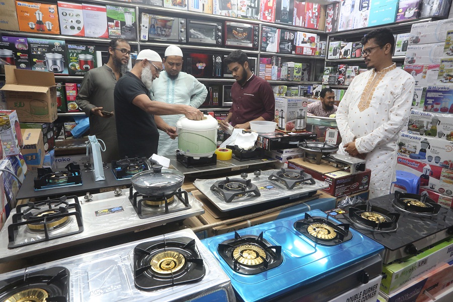 Customers at a brand shop of electric appliances in Dhaka as shopping gathers pace ahead of Eid
