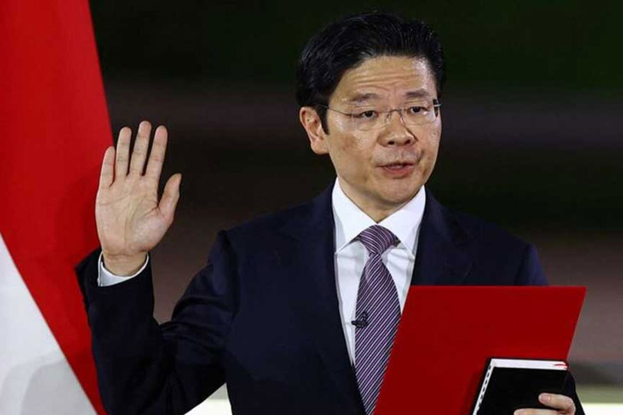 Singapore’s Deputy Prime Minister Lawrence Wong is sworn in as Singapore’s fourth Prime Minister at the Istana, in Singapore, May 15, 2024.