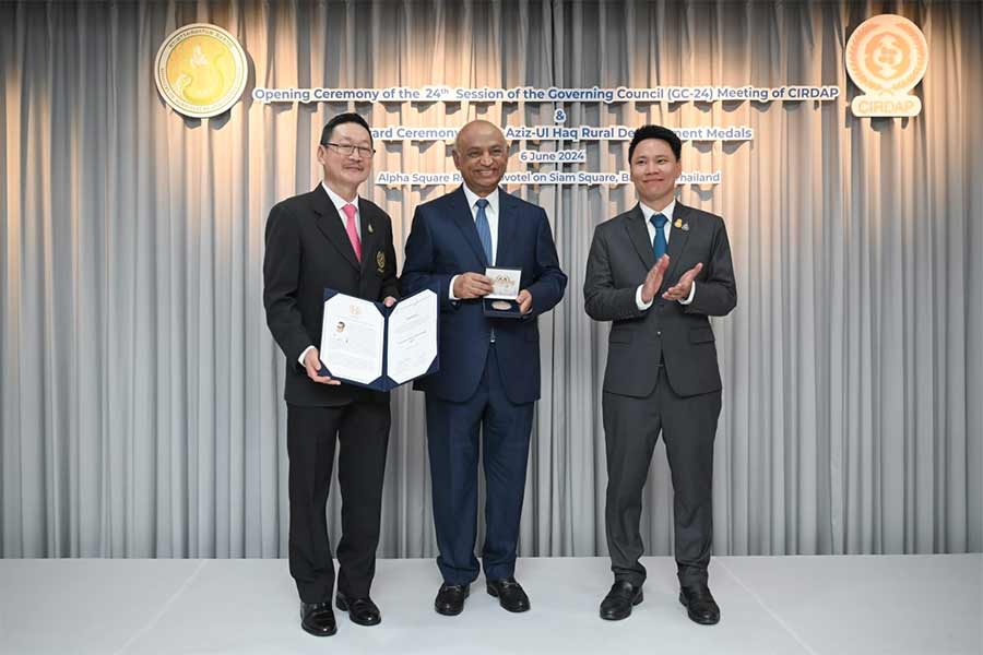 Syed Mahmudul Huq, Chairman of BSFF, is flanked by Thai Deputy Agriculture and Cooperative Minister Mr. Atthakorn Sirilatthayakorn on the left and Director General, CIRDAP Dr. Cherdsak Virapat on the right