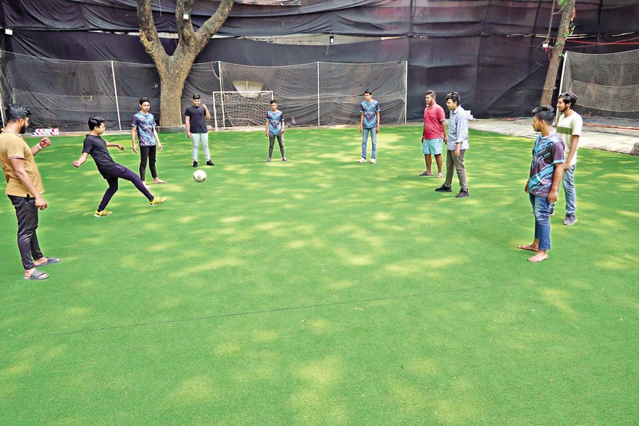 Children play on a private rental playground at Segun Bagicha in the capital on Wednesday — FE/File