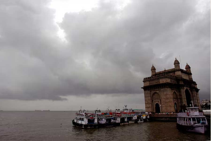 Monsoon clouds gather over the Gateway of India in Mumbai August 1, 2007.