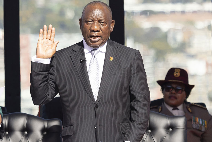 South Africa’s Cyril Ramaphosa, is sworn in as President at his inauguration at the Union Buildings in Tshwane, South Africa, Wednesday, June 19, 2024.