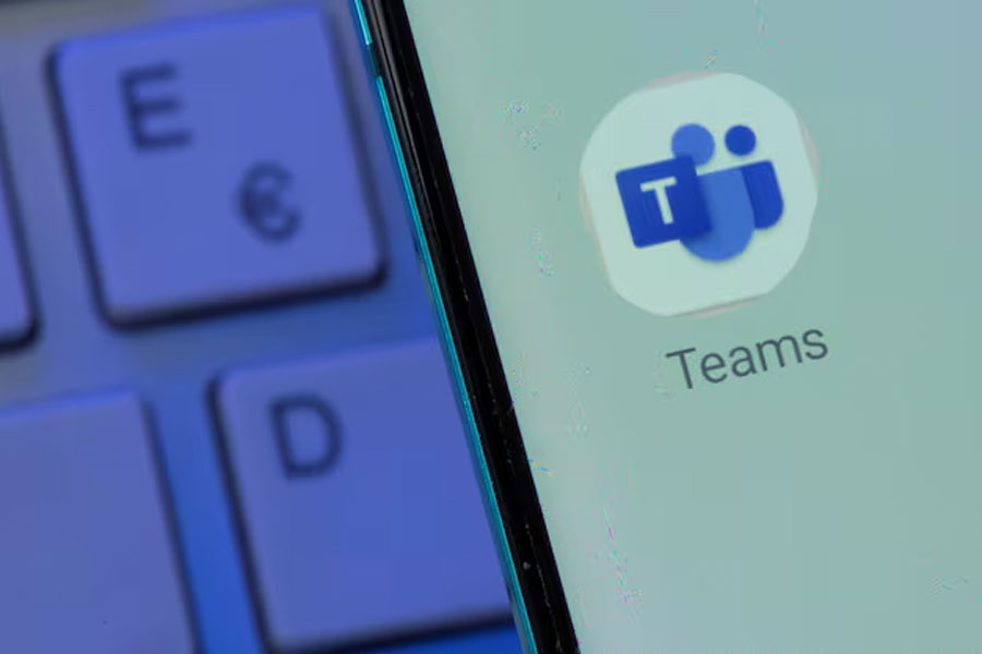 Microsoft Teams app is seen on the smartphone placed on the keyboard in this illustration taken, July 26, 2021.
