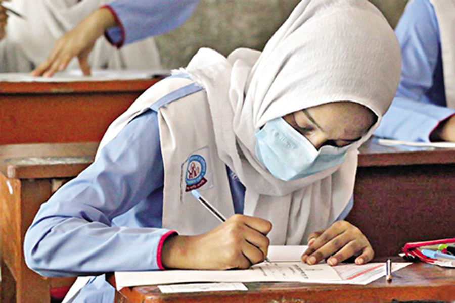 A student takes exam at the Secondary School Certificate (SSC) examination site in Dhaka, Bangladesh on Sept 15, 2022.