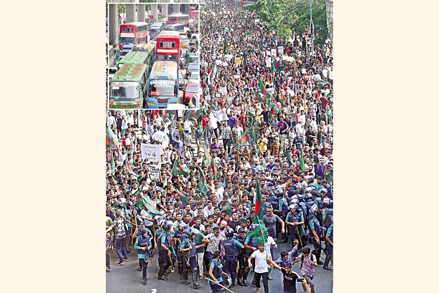 Thousands of students and job seekers march through Dhaka in protest against job quotas in public recruitment. Traffic on key routes in the city (inset) was severely disrupted for several hours as a result of the demonstration. — FE Photo by Asad-Uz-Zaman