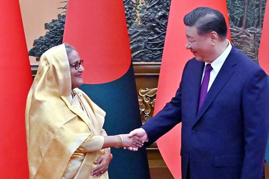 Bangladesh Prime Minister Sheikh Hasina and China President Xi Jinping shake hands in Beijing, China on July 10, 2024 — PID photo