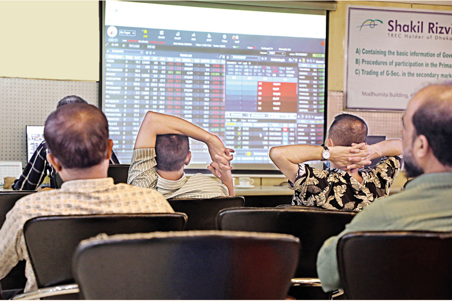 Investors could trade in stocks on Wednesday only from brokerage houses due to limited accessibility of Internet. Mobile Internet connections remained suspended while broadband Internet was resumed. The photo was taken at a brokerage firm in the capital's Motijheel.