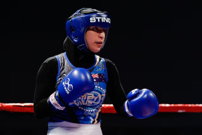 Apr 18, 2024; Pueblo, Colorado, USA; Tina Rahimi (AUS) in blue competes in the elite female 57kg category at Pueblo Convention Center. Mandatory Credit: Isaiah J. Downing-USA TODAY Sports/File Photo