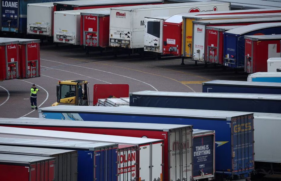 A port worker looks at lorry trailers at the port of Holyhead in Wales, Britain on February 27, 2023 — Reuters/Files