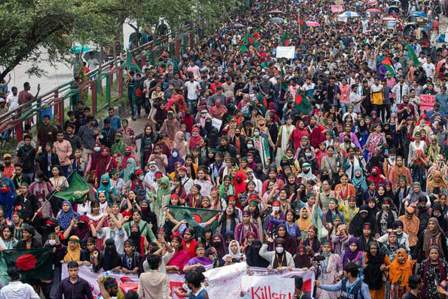 Students along with people from different sections of society on a street in Dhaka protesting the brutal regime of Hasina