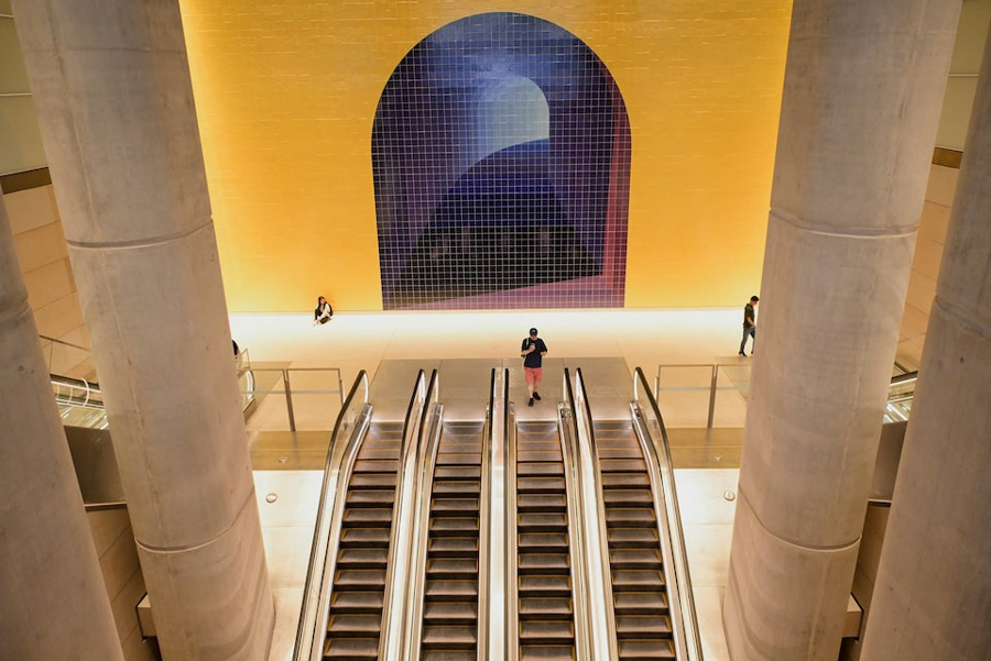 A commuter walks onto an escalator at Gadigal Station on the new Sydney Metro line in Sydney, Australia, August 25, 2024.