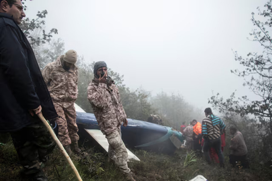 Rescue team works following a crash of a helicopter carrying Iran's President Ebrahim Raisi, in Varzaqan, East Azerbaijan Province, Iran, May 20, 2024 — Stringer/WANA (West Asia News Agency) via REUTERS/Files