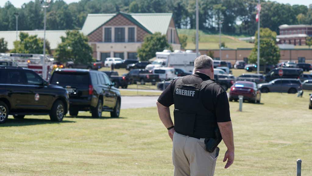 A law enforcement officer works near the scene of a shooting at Apalachee High School in Winder, Georgia, US September 4, 2024. REUTERS