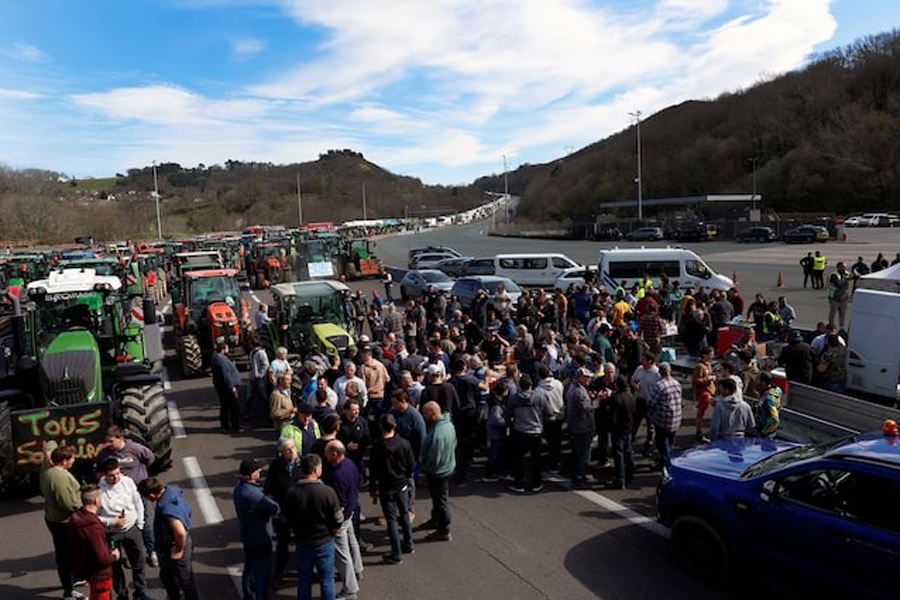 French and Spanish farmers block the motorway border between France and Spain during a protest over price pressures, taxes and green regulation, grievances shared by farmers across Europe, at Biriatou, France, March 7, 2024.