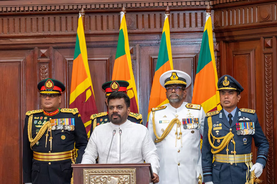 Sri Lanka's newly elected President Anura Kumara Dissanayake addresses a gathering after taking his oath of office at the Presidential Secretariat, in Colombo, Sri Lanka, September 23, 2024.