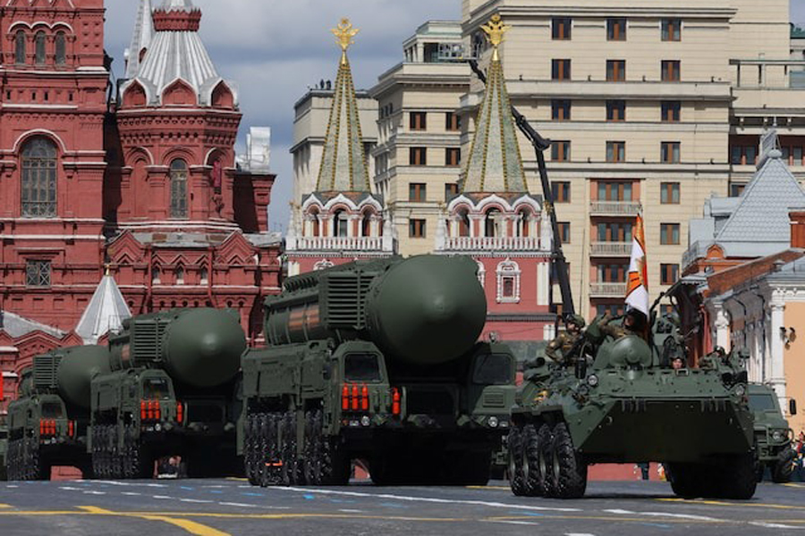 A Russian BTR-82A armoured personnel carrier and Yars intercontinental ballistic missile systems drive in Red Square during a parade on Victory Day, which marks the 77th anniversary of the victory over Nazi Germany in World War Two, in central Moscow, Russia May 9, 2022.