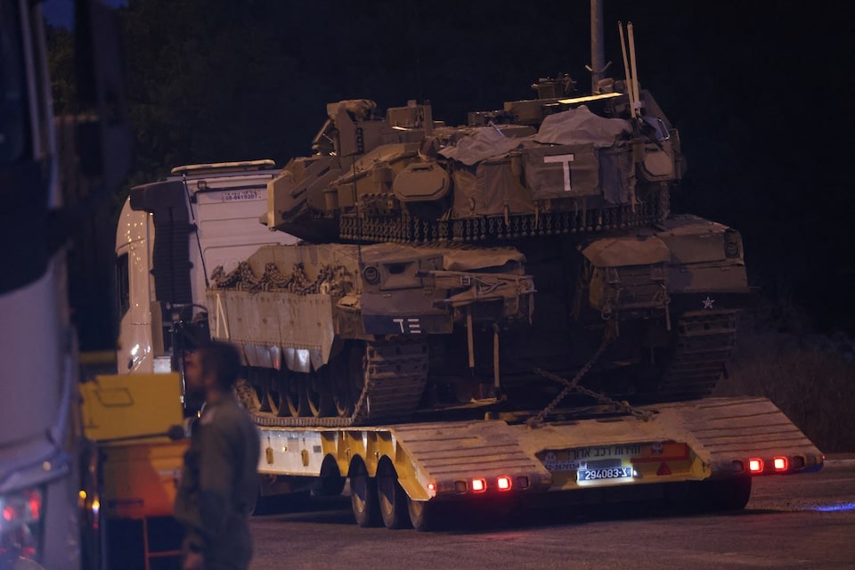 An Israeli Army tank is transported, amid cross-border hostilities between Hezbollah and Israel, in northern Israel on October 1, 2024 — Reuters photo