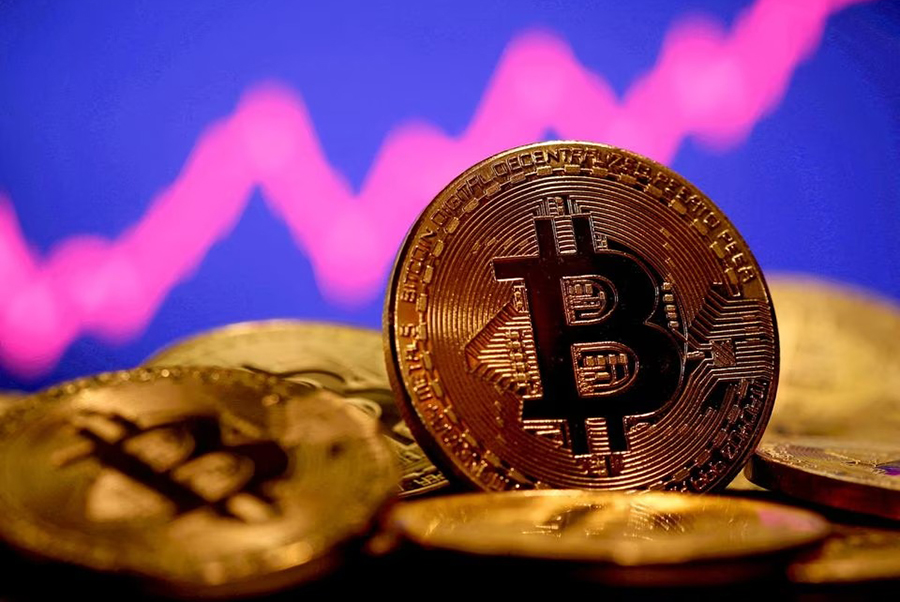 A representation of virtual currency Bitcoin is seen in front of a stock graph in this illustration taken on January 8, 2021 — Reuters/Files