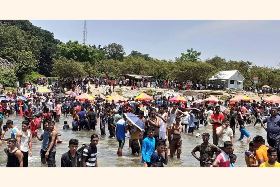 Tourist gathered at Jafflong (a tourist site) in Sylhet district