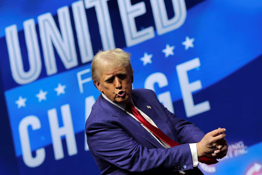 Republican presidential nominee and former U.S. President Donald Trump attends a campaign event sponsored by conservative group Turning Point Action, in Las Vegas, Nevada, U.S. October 24, 2024.