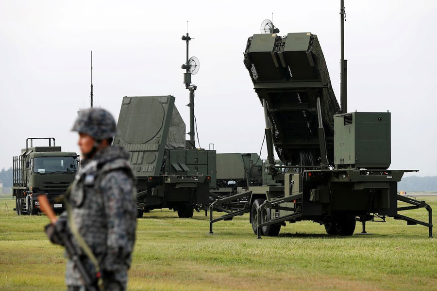 A Japan Self-Defense Forces (JSDF) soldier takes part in a drill to mobilise their Patriot Advanced Capability-3 (PAC-3) missile unit in response to a recent missile launch by North Korea, at US Air Force Yokota Air Base in Fussa on the outskirts of Tokyo, Japan August 29, 2017.