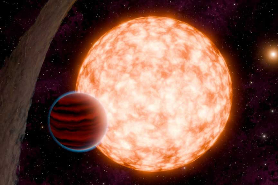 An artist’s depiction of a planet and its host star with a misaligned disk of material, and a binary companion in the background, is shown in this undated handout image.