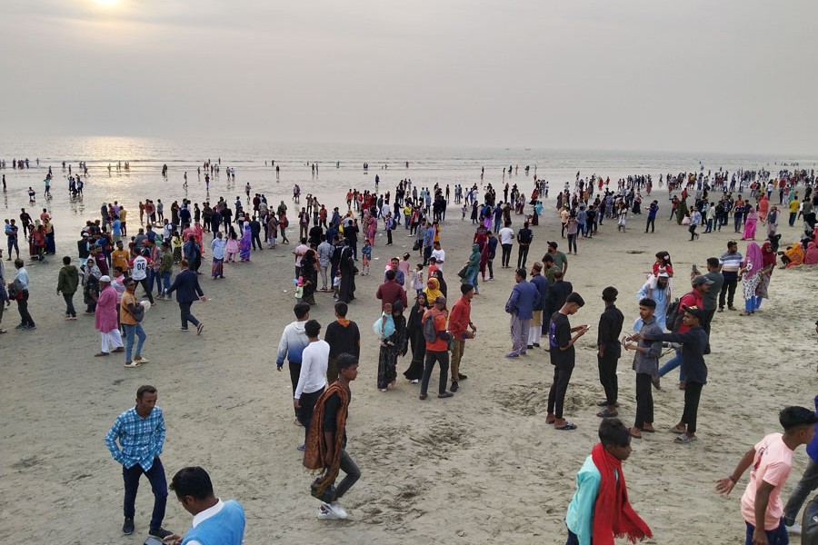 Tourists throng in large numbers the Inani tourist spot at the sea beach of Cox's Bazar
