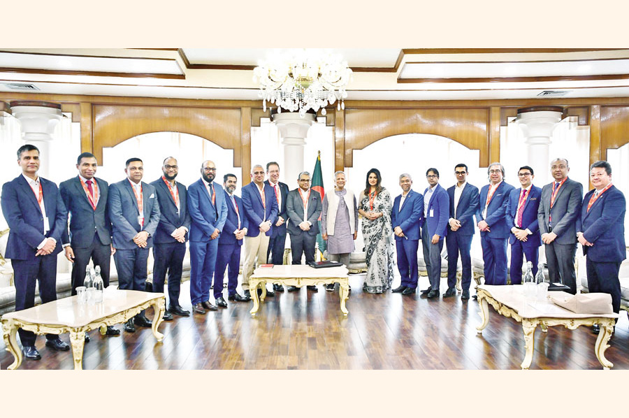 Chief executive officers of different multinational companies pose with Chief Adviser Professor Muhammad Yunus at State Guest House Jamuna in the city on Tuesday. — PID