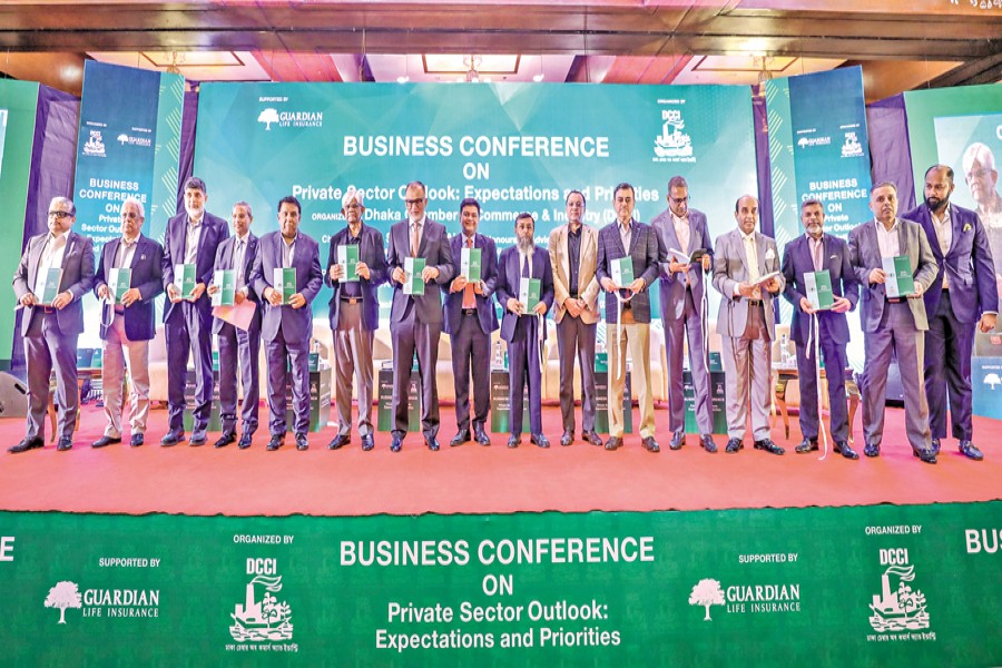 Finance Adviser Dr Salehuddin Ahmed and Commerce Adviser Sk. Bashir Uddin along with business leaders unveil the 'DCCI Journal of Business and Economic Policy' at a conference organised by the Dhaka Chamber of Commerce & Industry (DCCI) at a city hotel on Saturday