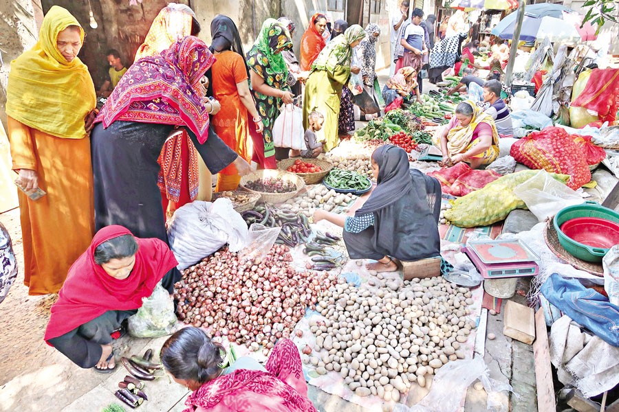 Consumers of low-income group thronged 'Goriber Bazar' (the market of the poor) at Sutrapur in Old Dhaka on Thursday to purchase various essential items in small quantities and at lower prices. The number of consumers in the market, seeking some respite amid sharp price hike of essentials, has been gradually rising