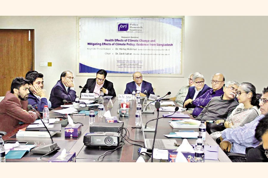 A roundtable, which discussed findings of the study 'Health Effects of Climate Change and Mitigating Effects of Climate Policy: Evidence from Bangladesh', in progress. The Policy Research Institute of Bangladesh (PRI) organised the event, presided over by PRI Chairman Zaidi Sattar, at its office on Wednesday