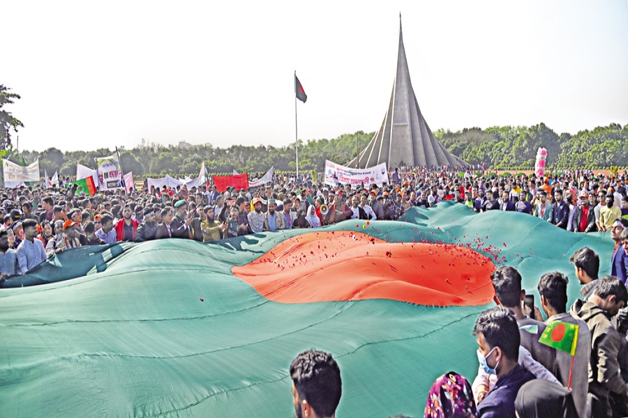 Enthusiastic people from all walks of life throng the National Memorial in Savar on Monday to pay tribute to the Liberation War martyrs, marking the Victory Day