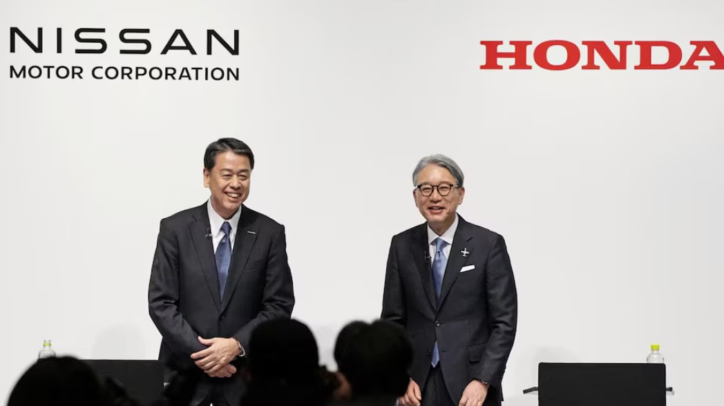 Makoto Uchida, president and CEO of Nissan Motor, and Toshihiro Mibe, Honda Motor president and CEO, attend their joint press conference in Tokyo, Japan March 15, 2024. Photo: Mandatory credit Kyodo/via REUTERS/File Photo