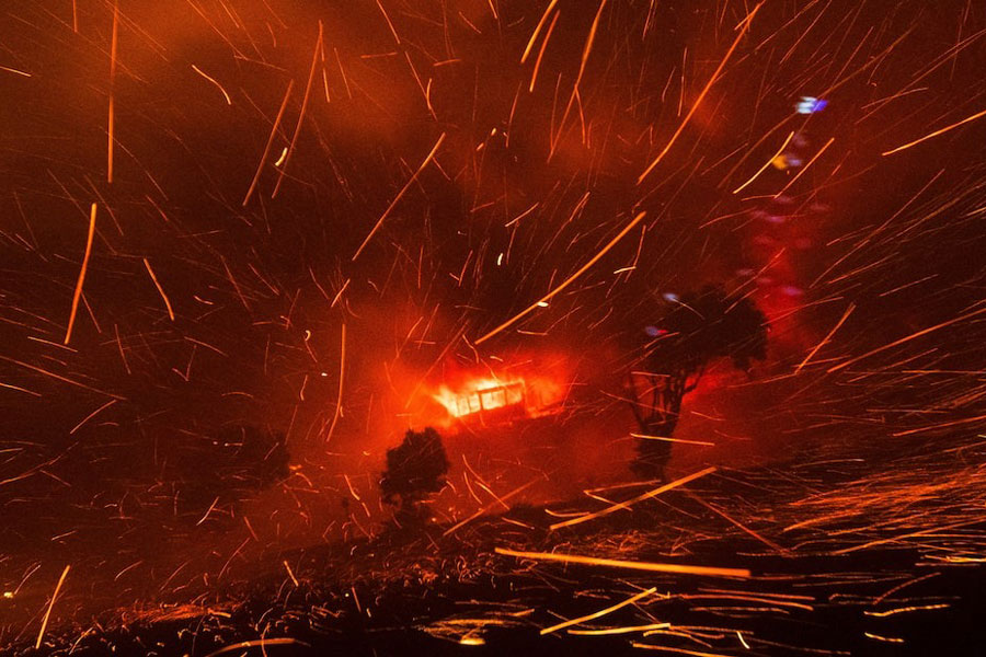 The wind whips embers as the Palisades Fire burns during a windstorm on the west side of Los Angeles, January 7.