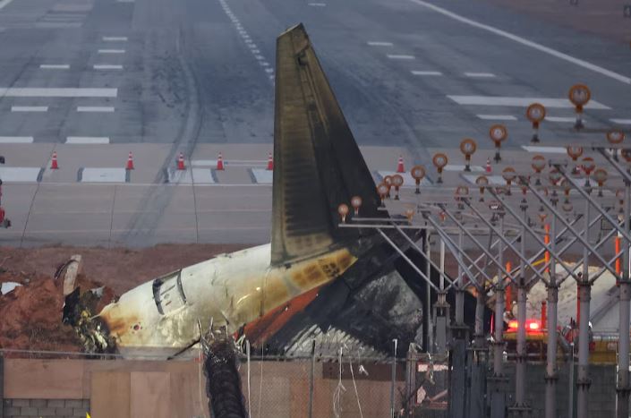The wreckage of the Jeju Air aircraft that went off the runway and crashed lies at Muan International Airport, in Muan, South Korea, December 30, 2024. REUTERS/Kim Hong-Ji/File Photo