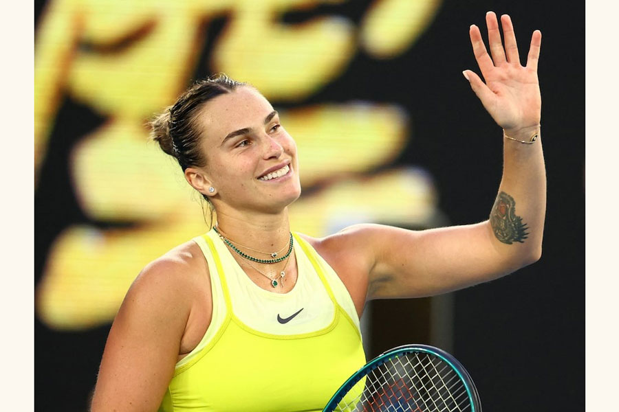Tennis - Australian Open - Melbourne Park, Melbourne, Australia - January 12, 2025 Belarus' Aryna Sabalenka celebrates winning her first round match against Sloane Stephens of the US.