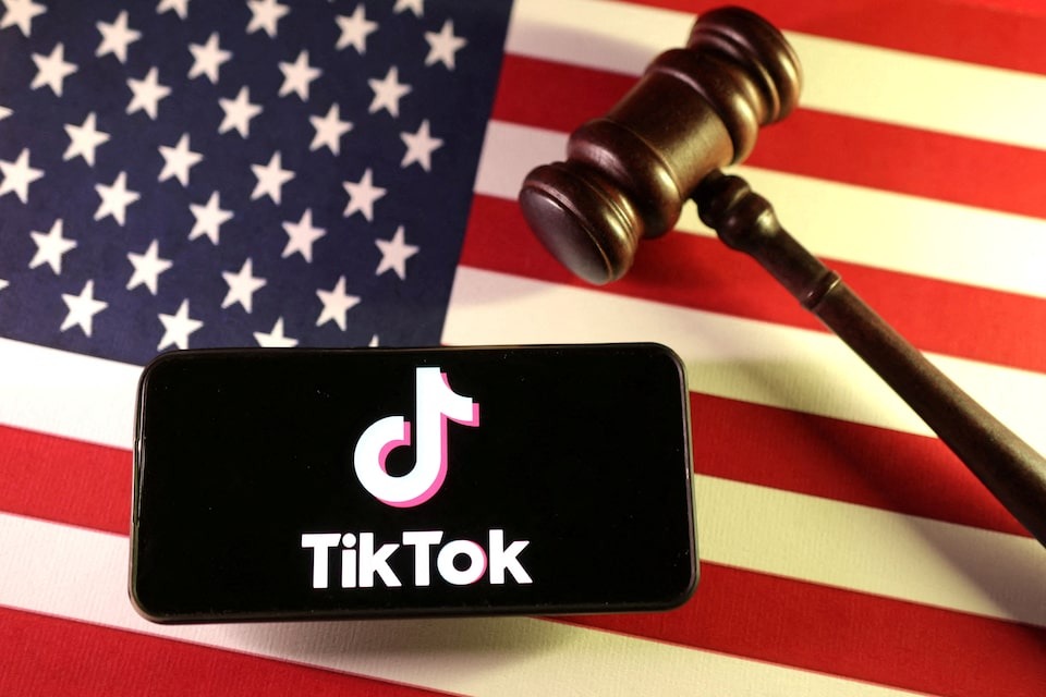 U.S. flag, TikTok logo and gavel are seen in this illustration taken on January 8, 2025 — Reuters illustration