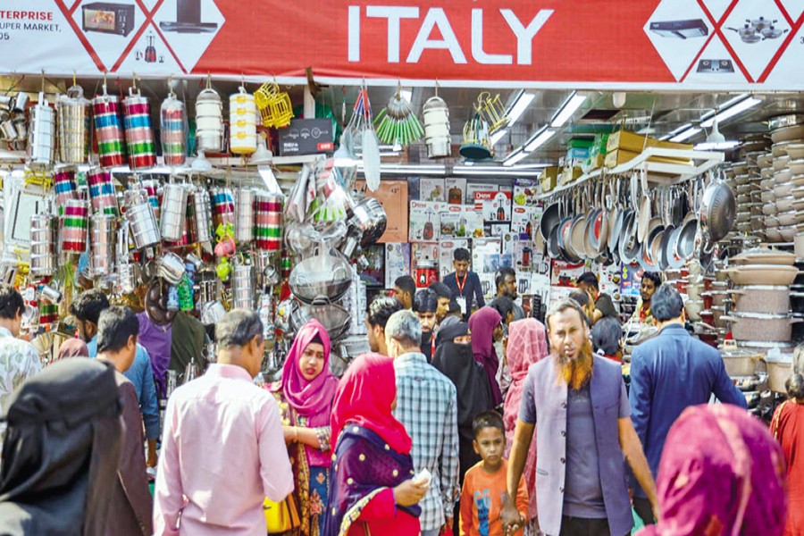 Visitors in their growing number throng the month-long Dhaka International Trade Fair (DITF) on Friday, a weekly holiday.