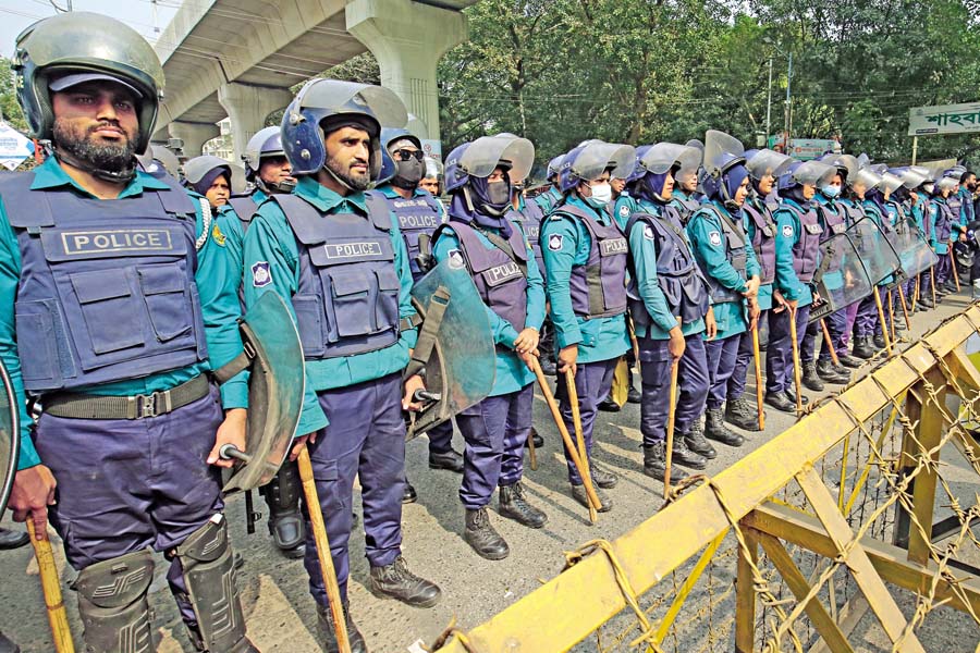 Police guarding barricade put up at the Shahbagh square on Sunday