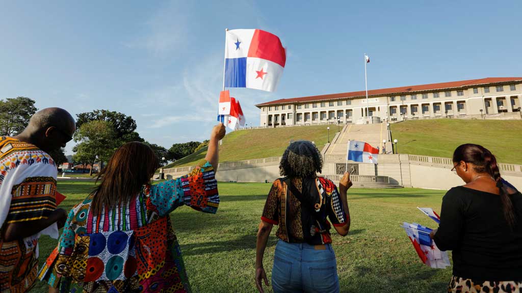 People hold Panama's national flags during a protest against US President Donald Trump who intends to reclaim the Panama Canal, days before the arrival of US Secretary of State Marco Rubio, in Panama City, Panama, January 30, 2025. REUTERS