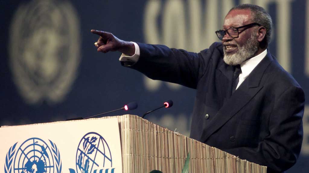 Namibian President Sam Nujoma lauches an attack on Britain and other former colonial powers as he addresses the plenary session of the Earth Summit in Johannesburg, SepT 2, 2002. REUTERS/Mike Hutchings REUTERS/File Photo