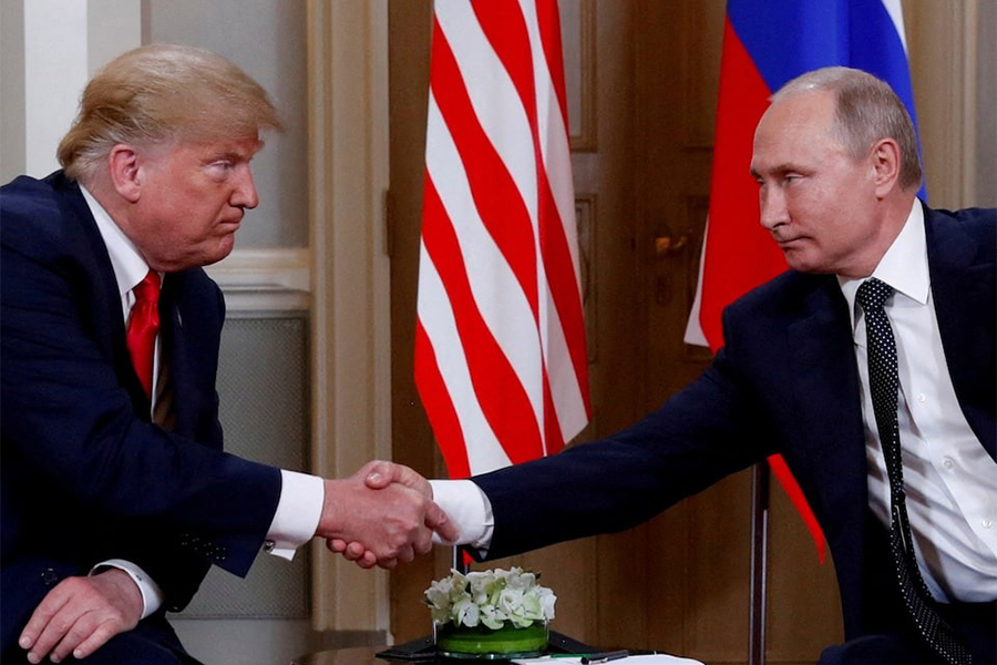 US President Donald Trump and Russian President Vladimir Putin shake hands as they meet in Helsinki, Finland on July 16, 2018 — Reuters/Files